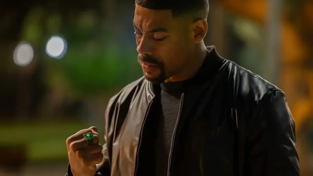 How the Lanterns Finale Sets Up John Stewart’s Role in Man of Tomorrow Aaron Pierre as John Stewart holding a power ring in the HBO series Lanterns