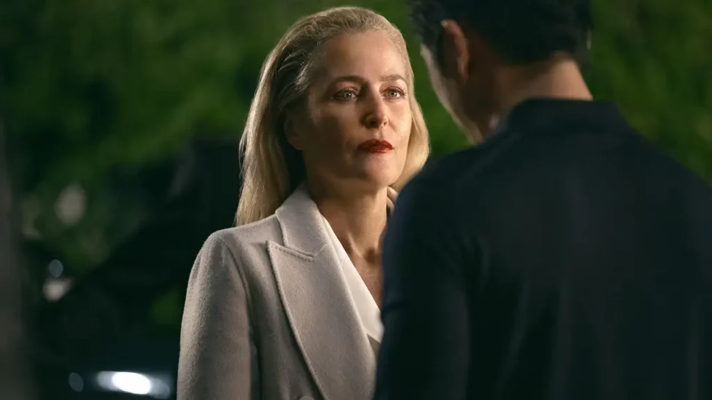 Gillian Anderson Reveals Dayle’s Ending in Animals Almost Went in a Very Different Direction Gillian Anderson wearing a light-colored tailored coat during a dramatic scene